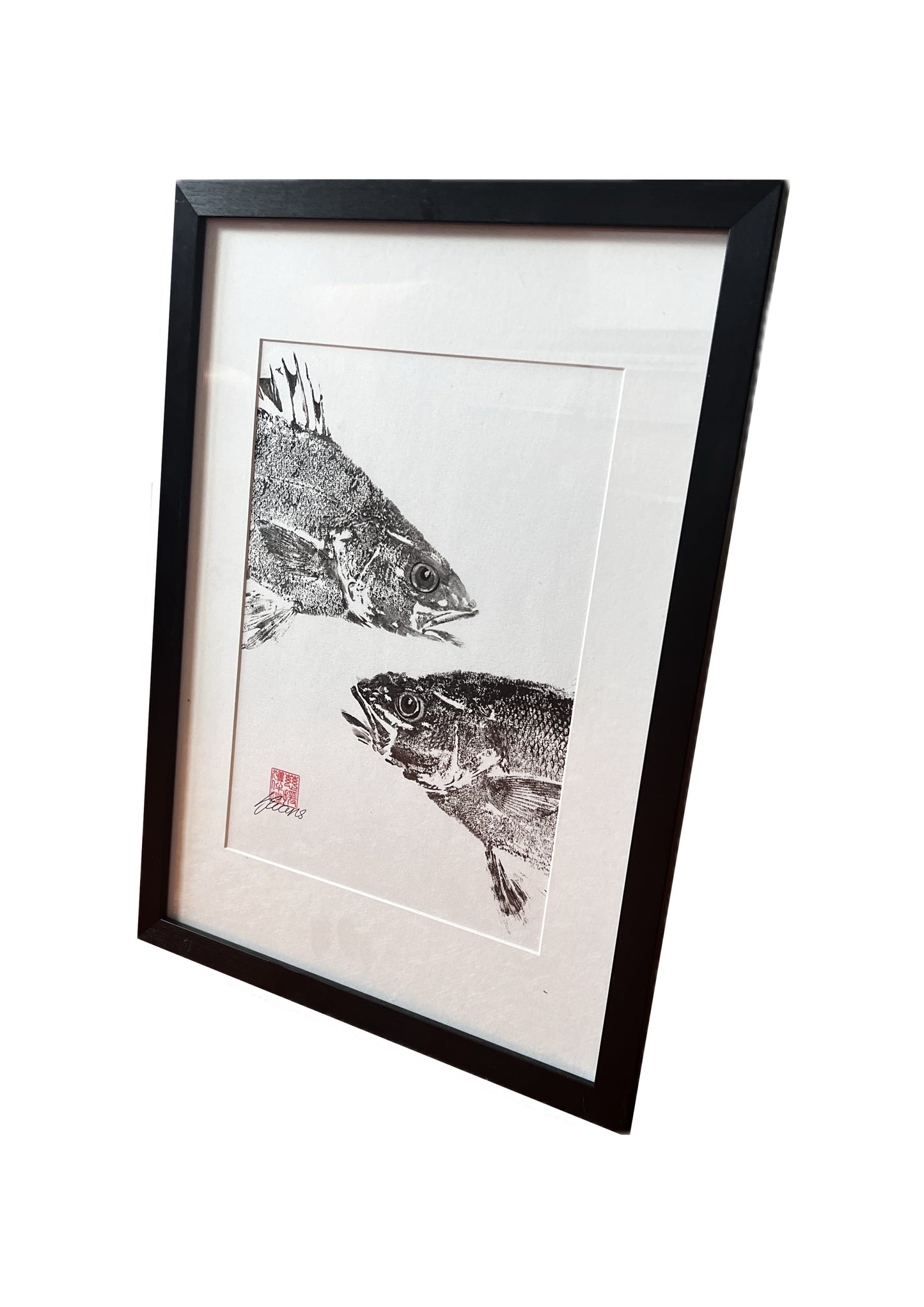 Just Passing (2 Sea Bass Heads printined in Sumi Ink) Framed