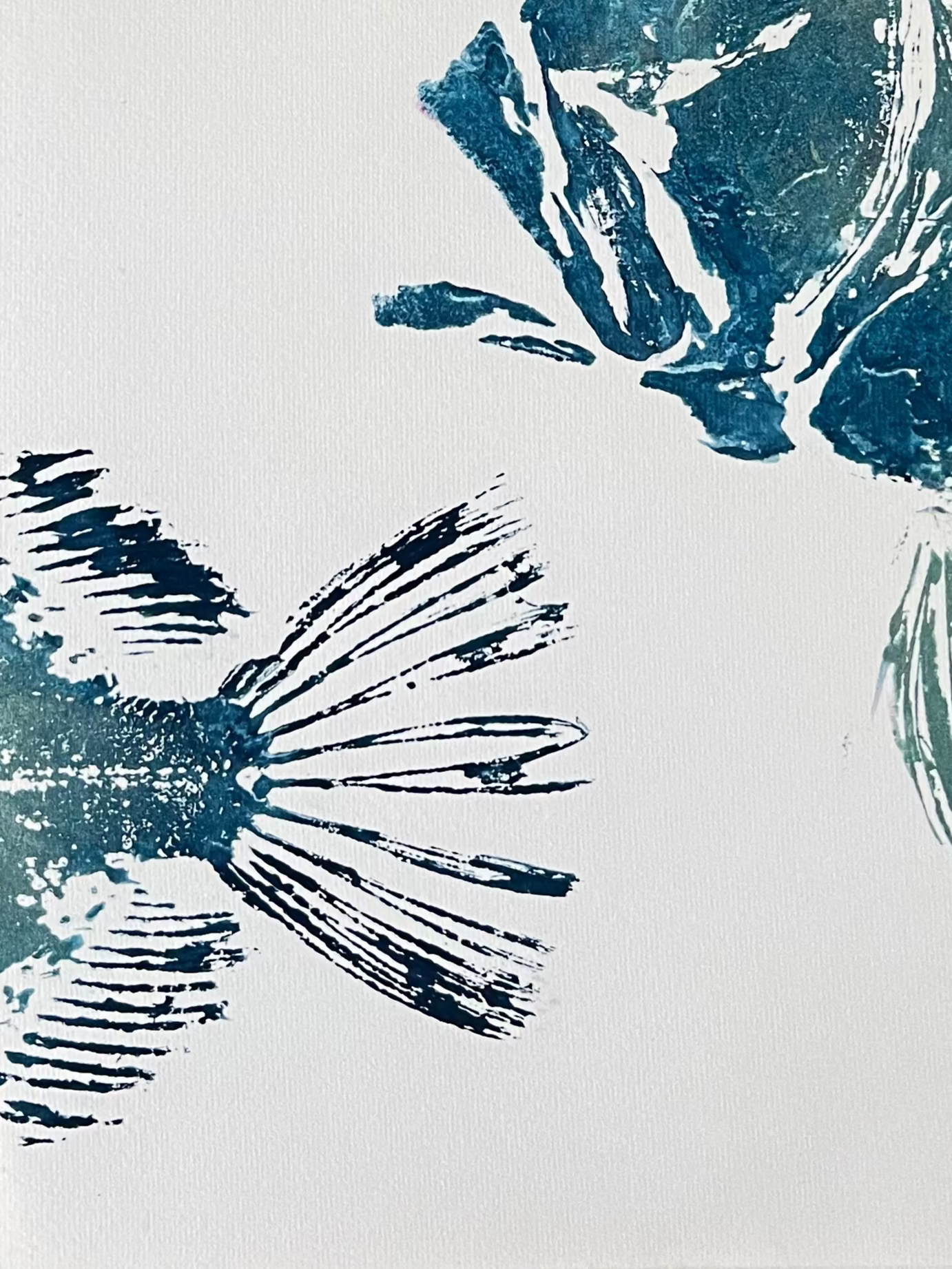 Card with a blue and white fish illustration on a textured brown background